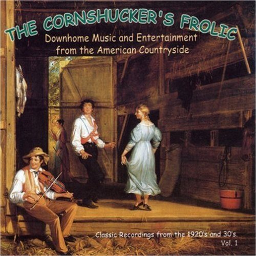 "CD cover art: barn scene with people dancing, man playing violin."