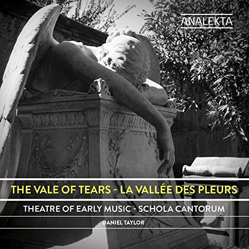Black and white image of a statue on a tomb, with text overlay.