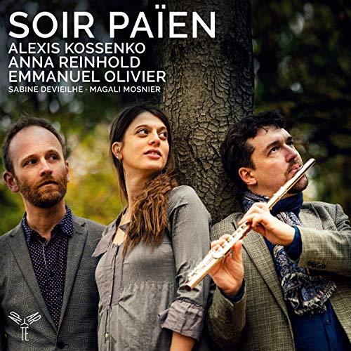 "CD cover featuring three musicians standing by a tree, one holding a flute."