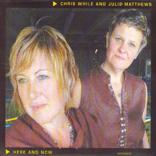 Album cover featuring a man and woman, both wearing red shirts, looking at the camera.