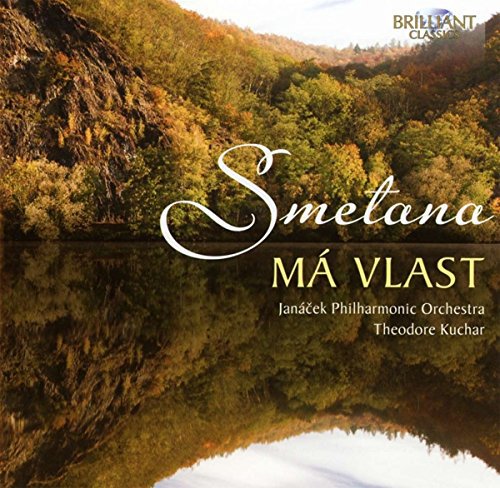 "CD cover with a serene lake and forested hillside, reflecting trees and sky."