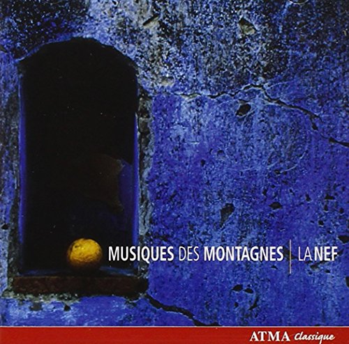 A CD cover with a blue stone wall and a small orange in a niche.
