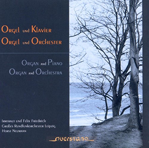 A CD cover with a dark blue background and a serene landscape photograph.