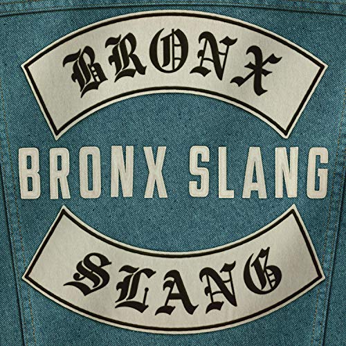 "Blue denim background with 'Bronx Slang' text in beige and black, gothic font."