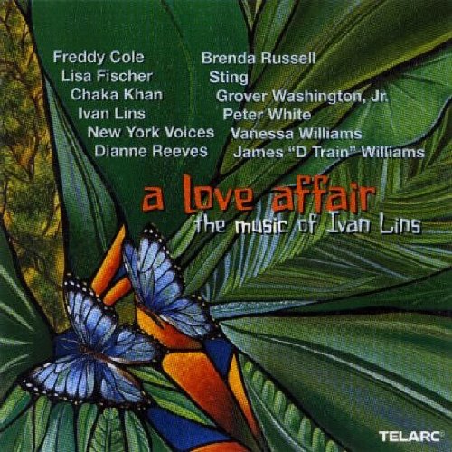"Album cover with green leaves, blue butterflies, and artist names in white text."