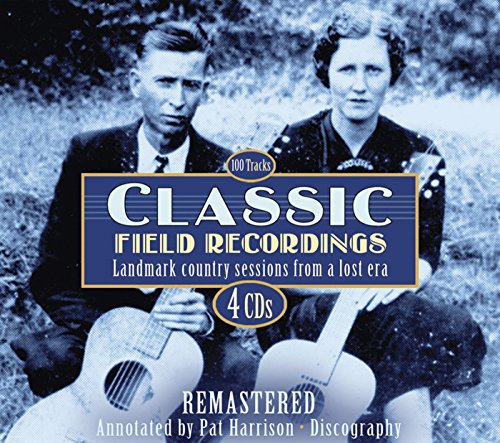 "CD cover with man and woman holding guitars, blue title banner, and white text."