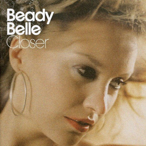 "CD album cover featuring a close-up of a woman's face with 'Beady Belle Closer' text."
