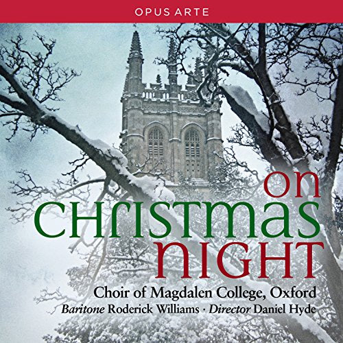 "CD cover featuring a snowy church with 'On Christmas Night' in red and green text."