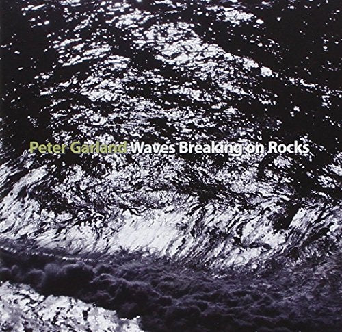 "Album cover featuring a black-and-white image of waves crashing with artist and album name."