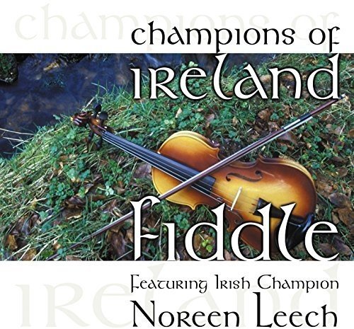 A fiddle lies on grass beside water, with text overlay on a white background.