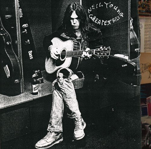 "CD cover with black-and-white image of Neil Young holding an acoustic guitar."