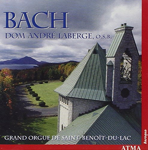 "CD cover featuring a stone church with a green roof and a serene landscape."