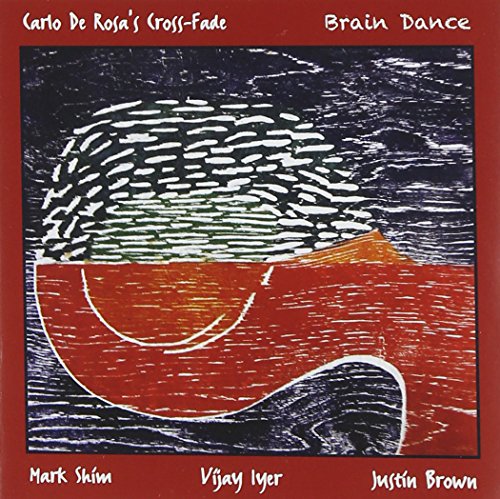 "Album cover with abstract red, white, and black design on a red background."