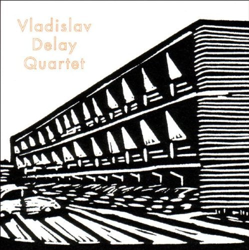"Album cover with black and white building illustration and orange text 'Vladislav Delay Quartet'."