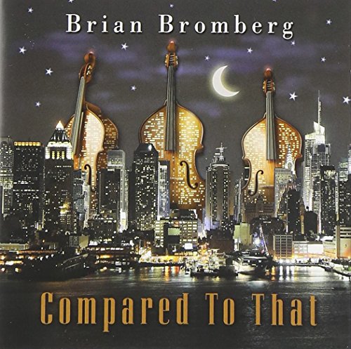 "Album cover with three double basses in a city skyline at night."