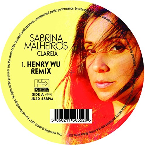 Vinyl record label with a woman's portrait and barcode on a yellow background.