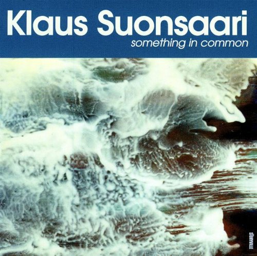 "Klaus Suonasaari's 'Something in Common' CD cover featuring a blue banner and abstract image."
