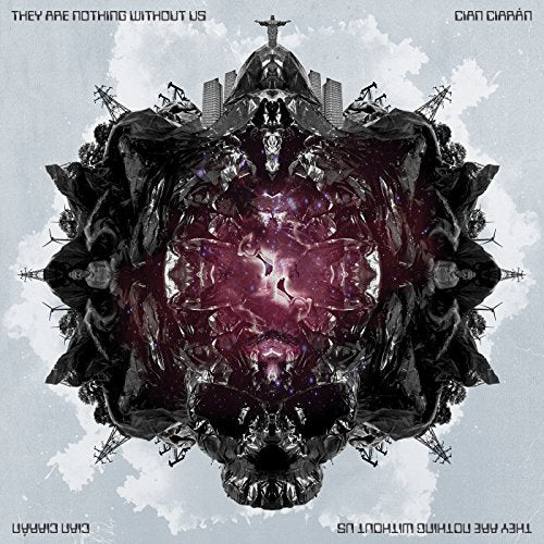 Album cover with a dark, mirrored skull and cityscape against a cloudy background.