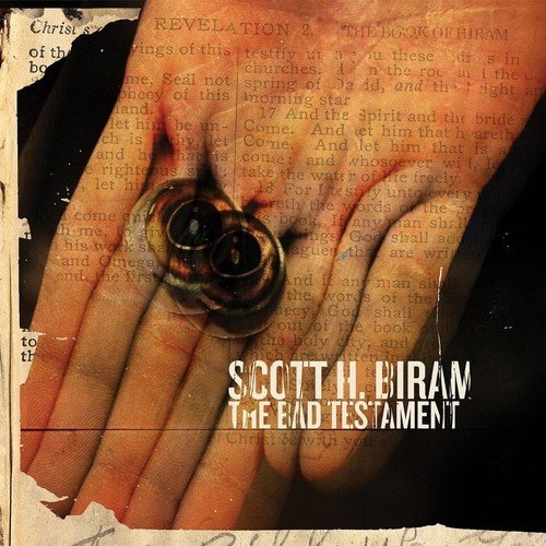 Album cover for "The Bad Testament" by Scott H. Biram, showing a hand holding handcuffs.