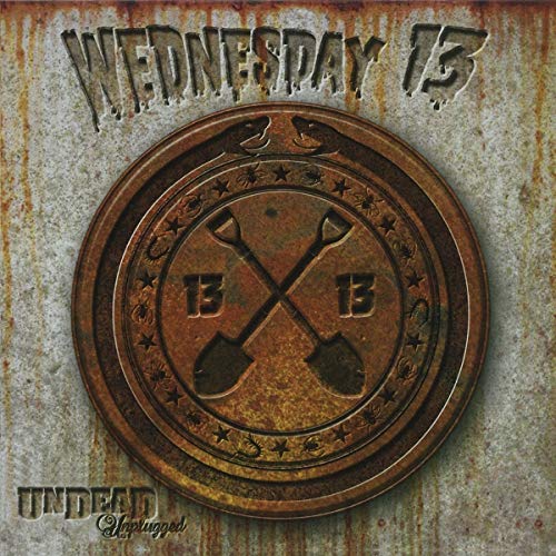"Album cover with rusty metal background and crossed shovels emblem, titled 'Wednesday 13 Undead'."