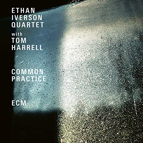 "Album cover with abstract, textured background and white text on a black border."