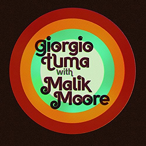 Vinyl record cover with multicolored concentric circles and artist names on a black background.