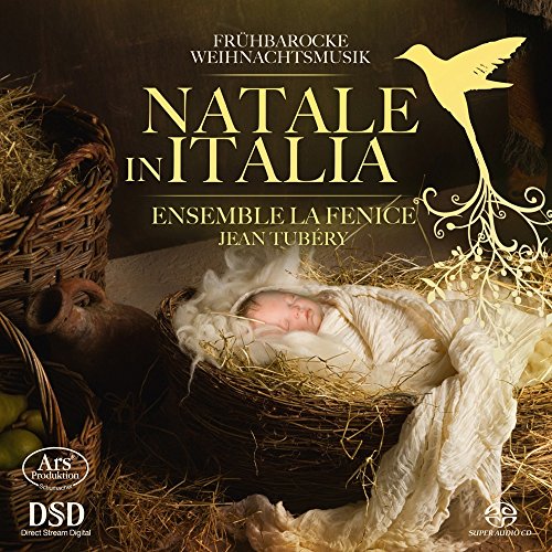 "CD cover featuring a nativity scene with a baby in a wicker basket."