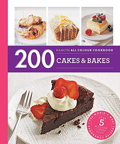 "Cookbook cover featuring a chocolate cake slice with strawberries and whipped cream."