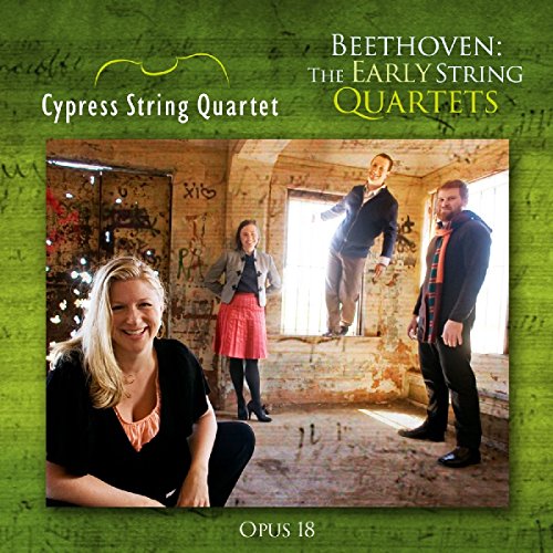 "CD cover with Cypress String Quartet members in a graffiti-covered room, green background."