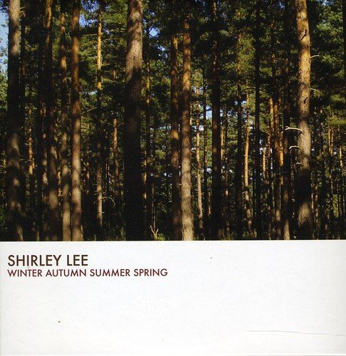 "Album cover featuring a forest scene with tall trees and artist Shirley Lee's name."