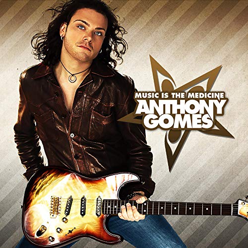 "Album cover featuring a man holding a guitar, with text 'Anthony Gomes' and 'Music Is The Medicine'."