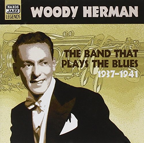 CD cover with Woody Herman in tuxedo, beige background, and musical instrument illustrations.