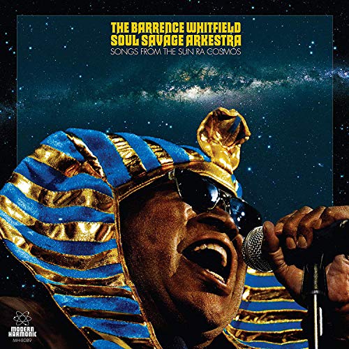 Album cover with man in Egyptian headdress singing into a microphone against a galaxy backdrop.
