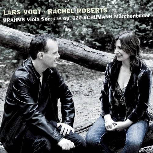 Black and white CD cover featuring a man and woman sitting together outdoors.