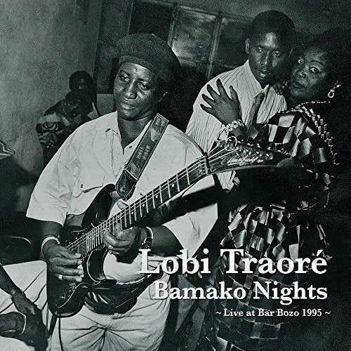 Black-and-white album cover featuring a man playing guitar with people around him.