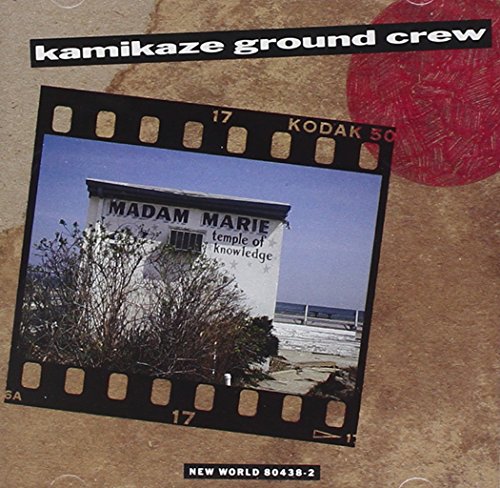 "CD cover with film strip image of a white building and ocean."