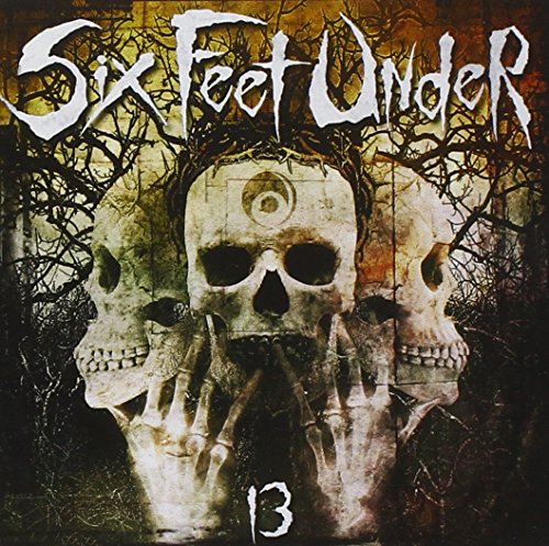 "Album cover with three skulls and 'Six Feet Under' text in white."