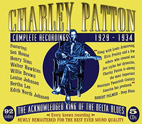 Yellow CD cover featuring a man playing guitar, titled "Charley Patton Complete Recordings".