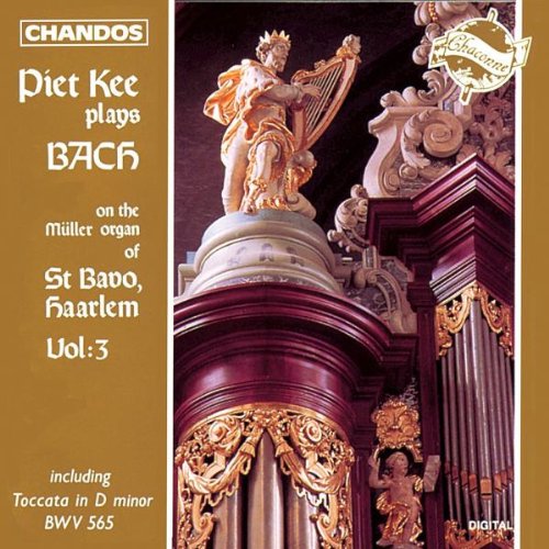 CD cover featuring a golden statue on a pipe organ with brown background.