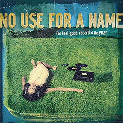 Album cover: person lying in grass with a vintage record player.