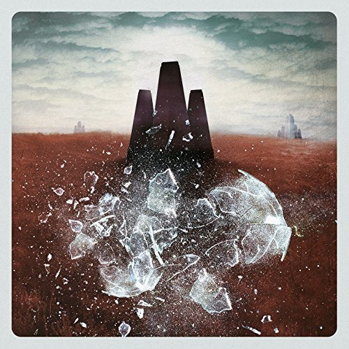 A vinyl record cover featuring a shattered globe and dark, abstract structures.