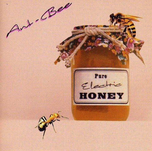 A jar of honey with bees and a label reading "Pure Electric Honey".