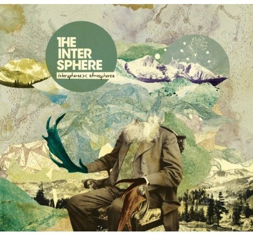 Album cover with abstract background, man with deer antlers, and orange title circle.