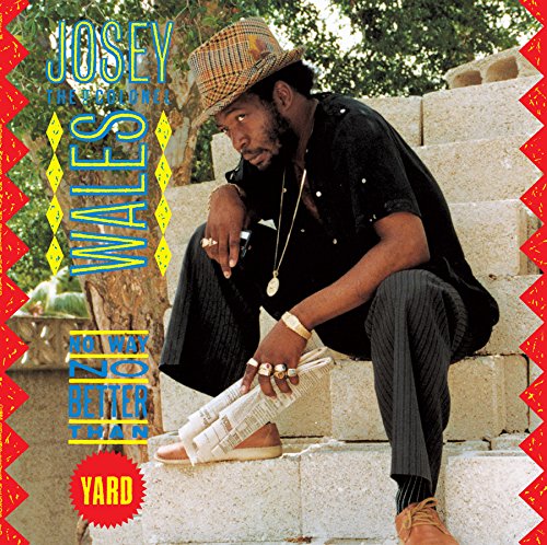 "Vinyl record cover featuring a man sitting on stone steps, wearing a straw hat."