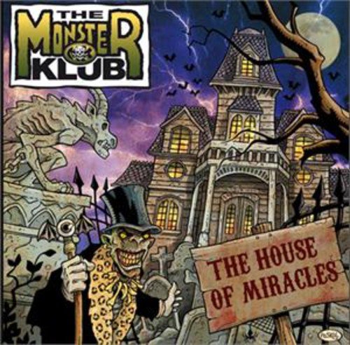 CD cover: haunted house, monster, and spooky graveyard scene illustration.