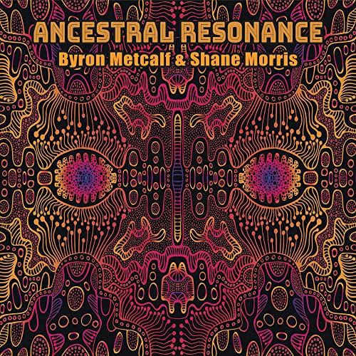 CD cover with symmetrical, colorful psychedelic illustration and text.