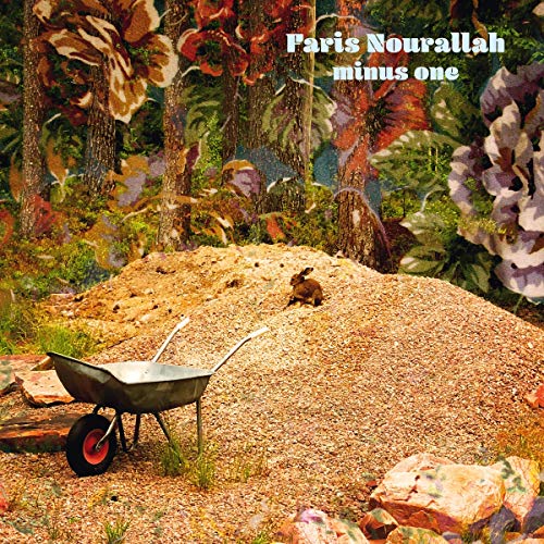 A wheelbarrow on a pile of sand, surrounded by colorful floral background.