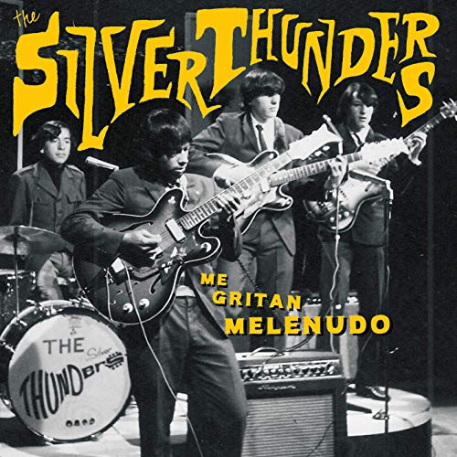 "Black and white image of a band playing on stage with yellow text overlay."