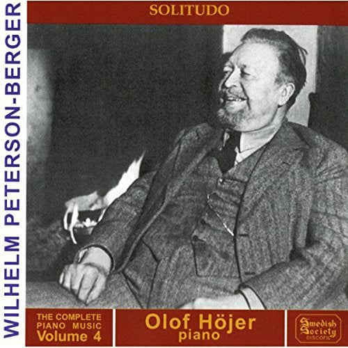 Black and white photo of a man on a red CD cover.