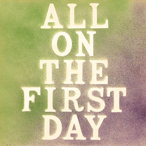 Vinyl record cover with "All on the First Day" in white text on green and purple background.